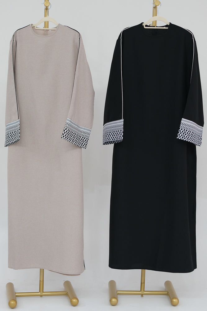 Umm Obeida Traditional abaya with contrast keffiya cuffs and piping alongside hems