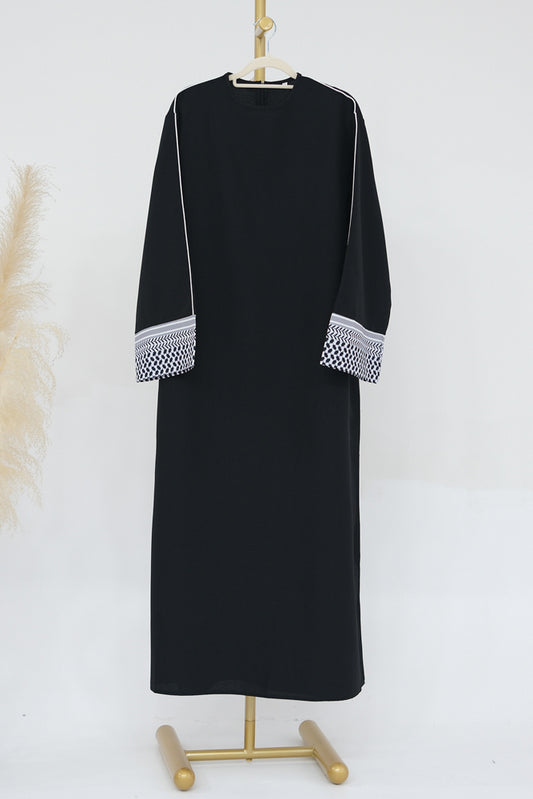 Obeida Traditional abaya with contrast keffiya cuffs and piping alongside hems