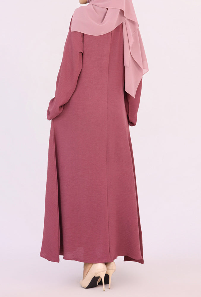 Dark Pink Kira loose slip dress with pockets in maxi length and with long sleeve