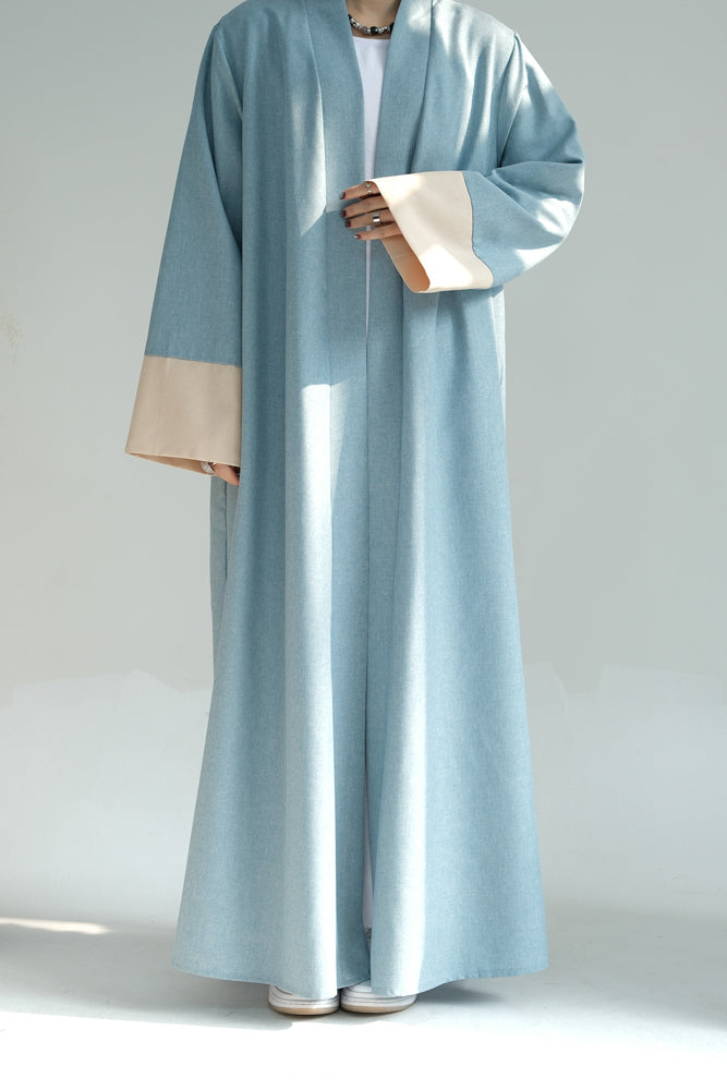 Hina in Blue casual sporty abaya throw over with contrast sleeve cuffs in beige open front abaya