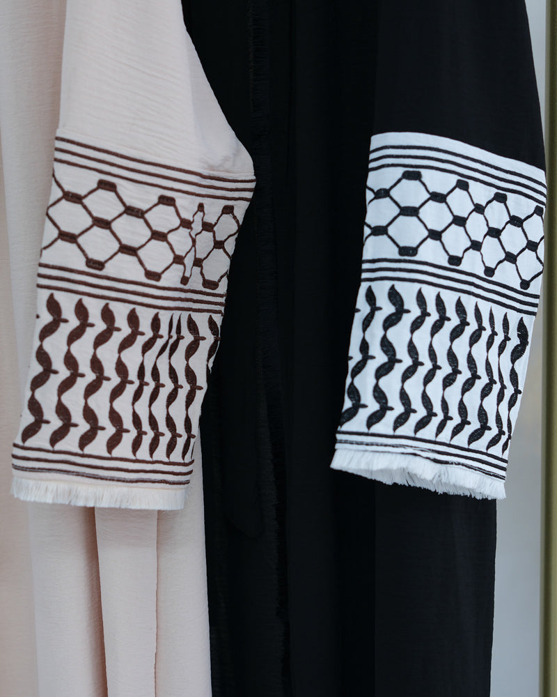 White Keffiyeh Inspired Abaya with contrast embroidered sleeves and detachable belt
