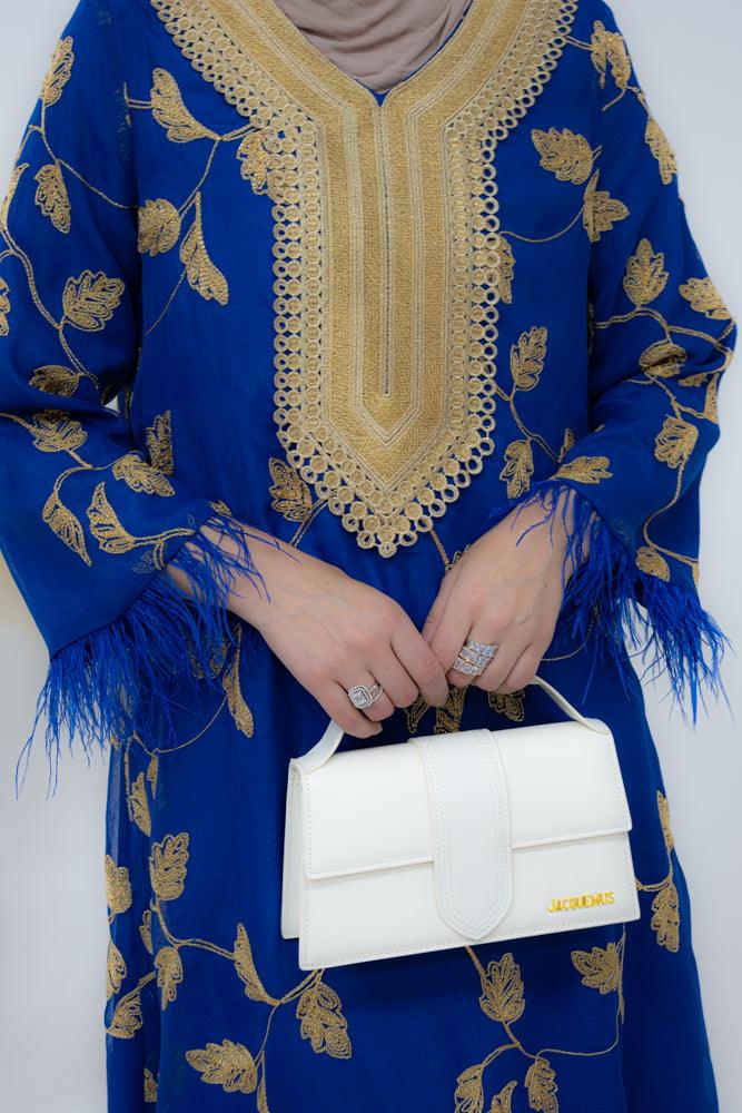 Listya Kaftan dress with leaves embroidery and feather decorated sleeve cuffs in royal blue - ANNAH HARIRI
