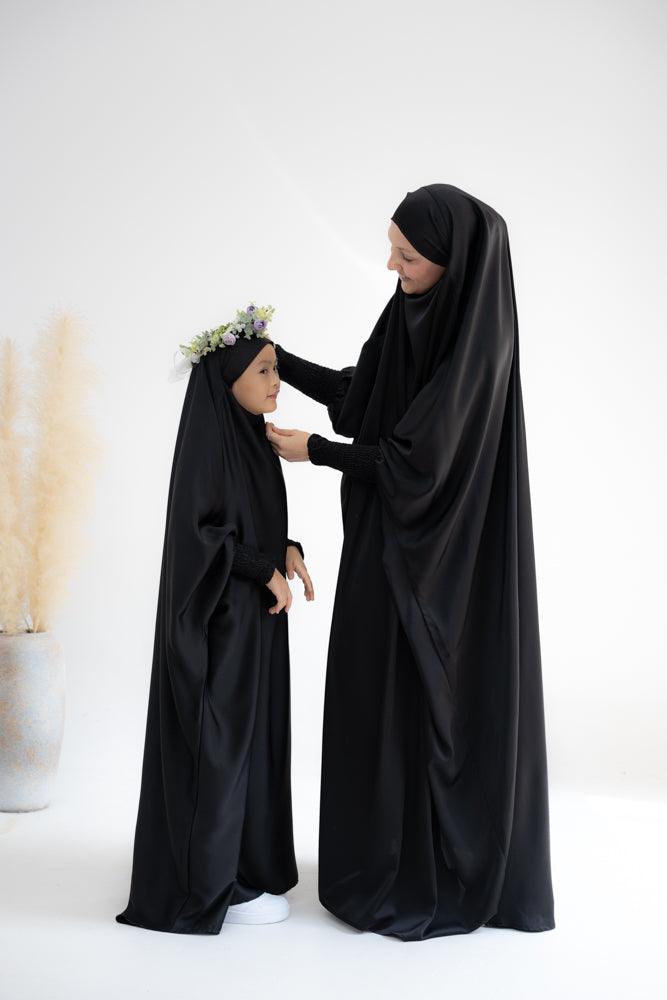 Little Gretaah prayer gown for kids in khimar style with ribbed sleeve cuff in Black - ANNAH HARIRI