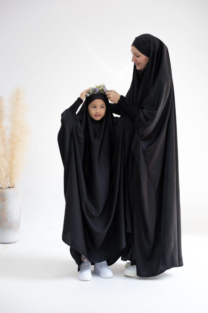 Little Gretaah prayer gown for kids in khimar style with ribbed sleeve cuff in Black - ANNAH HARIRI