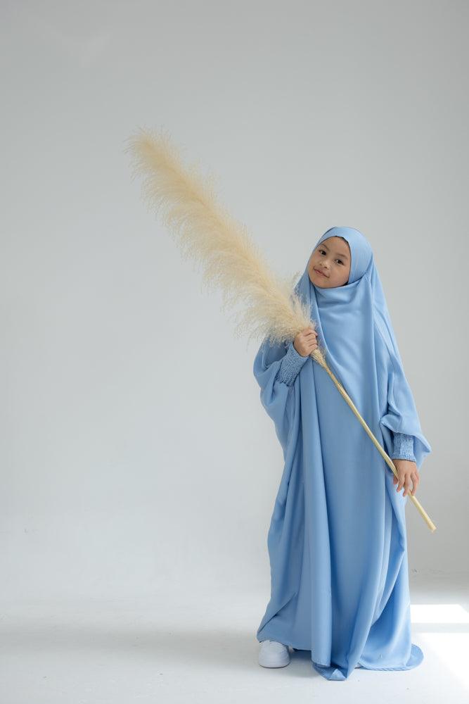 Little Gretaah prayer gown for kids in khimar style with ribbed sleeve cuff inSky Blue - ANNAH HARIRI