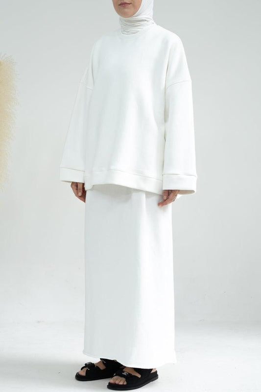Twill maxi pencil skirt with pockets and elasticated waist band in white - ANNAH HARIRI