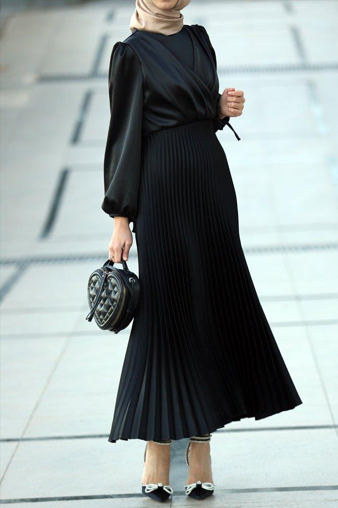 Abigal satin pleated long sleeve maxi dress with wrap waist in black - ANNAH HARIRI