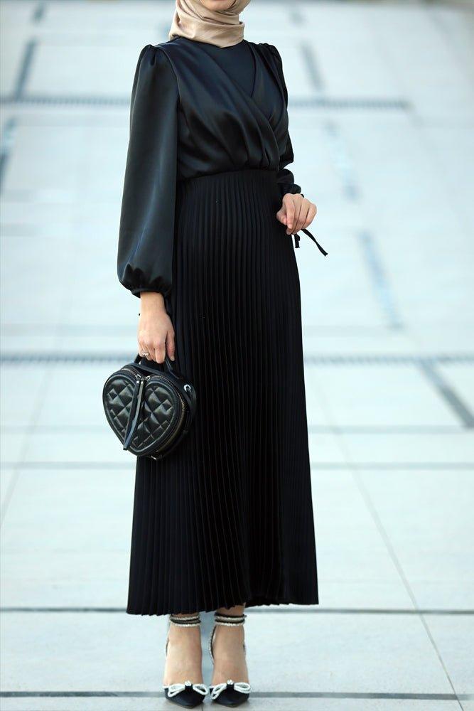 Abigal satin pleated long sleeve maxi dress with wrap waist in black - ANNAH HARIRI