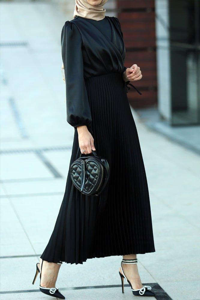 Abigal satin pleated long sleeve maxi dress with wrap waist in black - ANNAH HARIRI