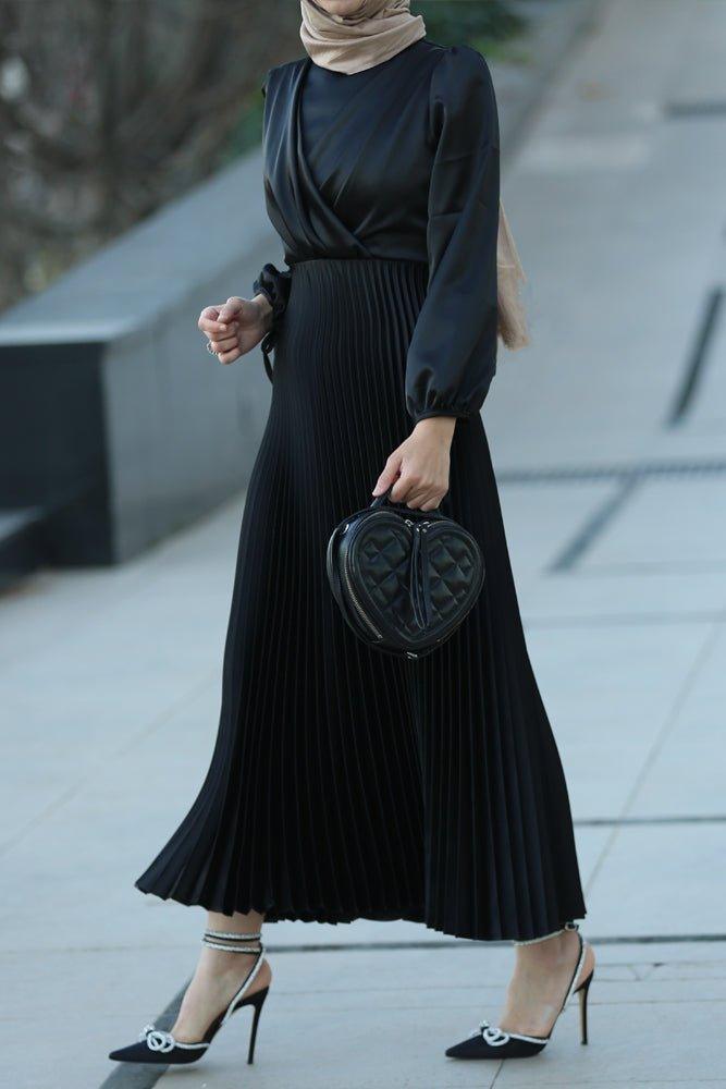 Abigal satin pleated long sleeve maxi dress with wrap waist in black - ANNAH HARIRI