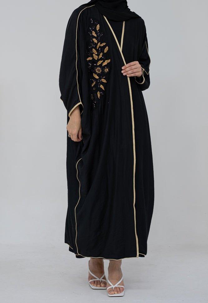 Queen Bisht with golden color embroidery and batwing cut in black - ANNAH HARIRI