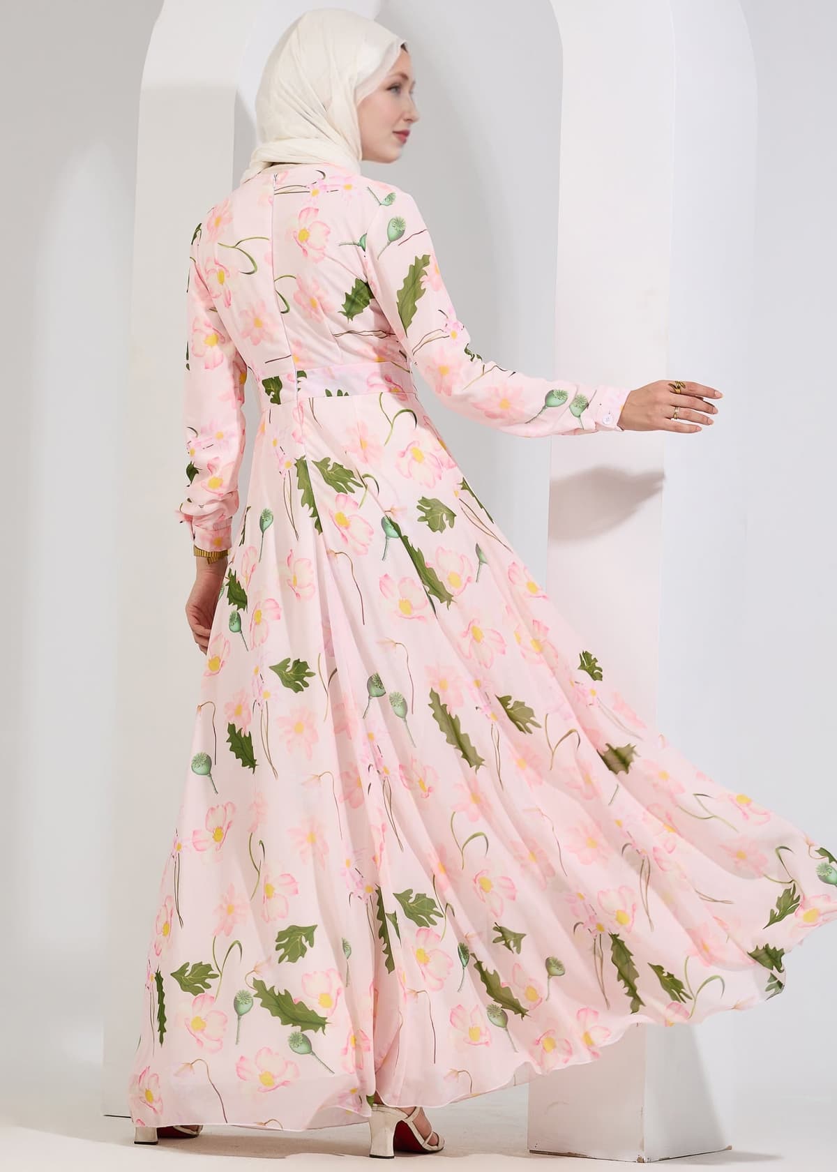 Back view of blush floral chiffon maxi dress with floral print