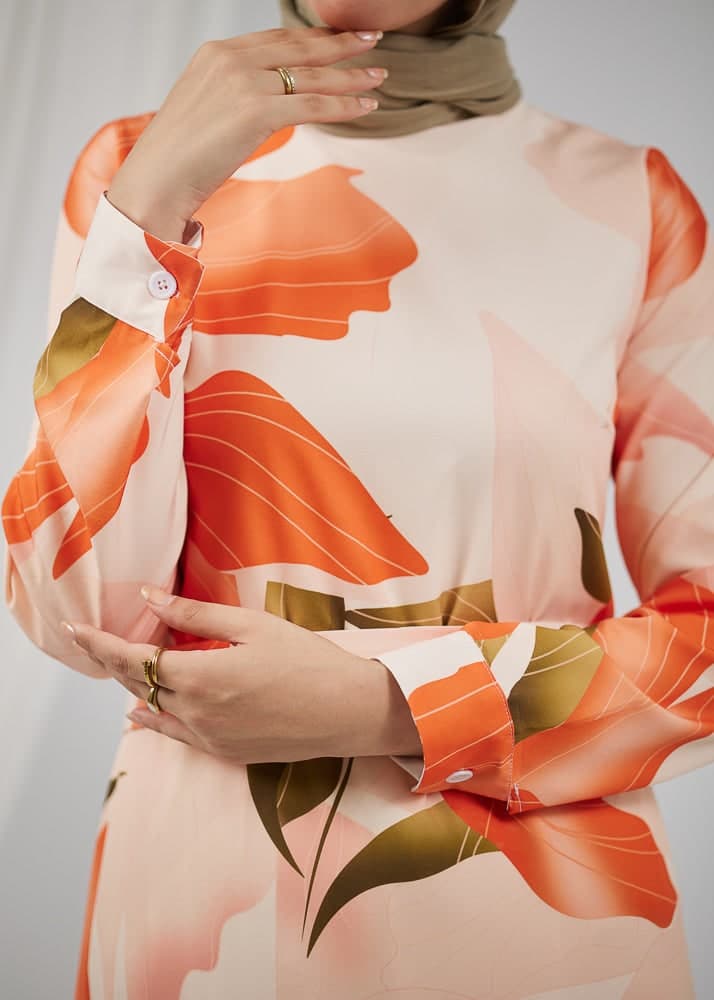 Detailed view of floral pattern on Peach Floral Satin Maxi Dress