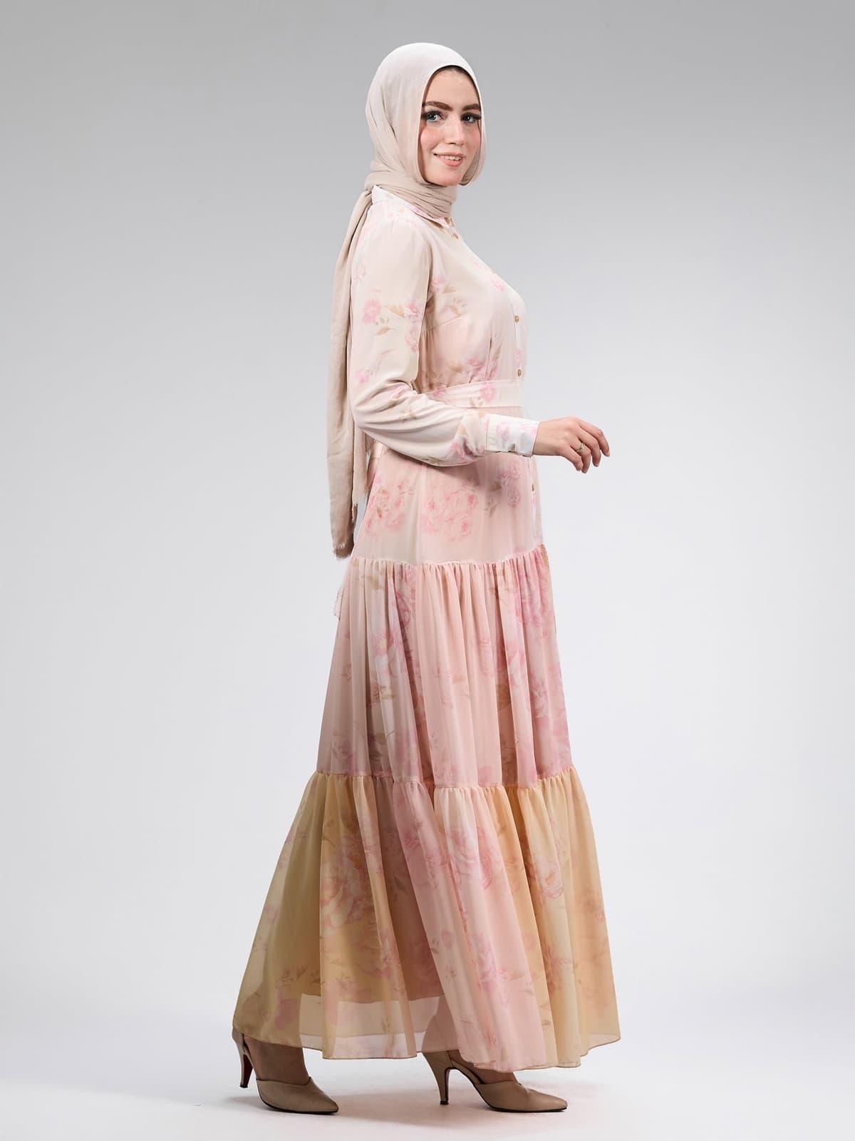 Movement shot of the chiffon dress highlighting its flowing fabric