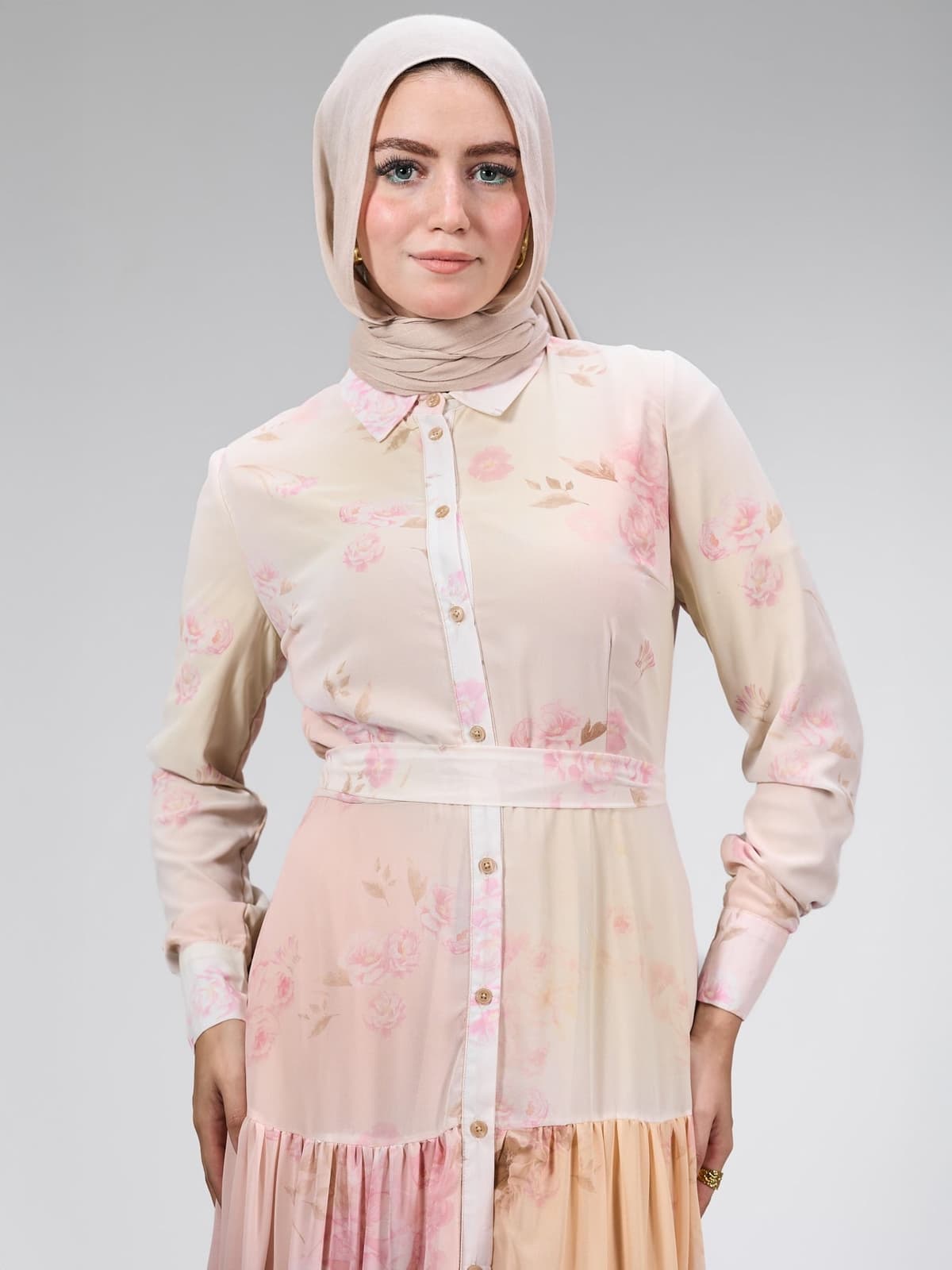 Side angle of the blush pink floral chiffon maxi dress in modest style