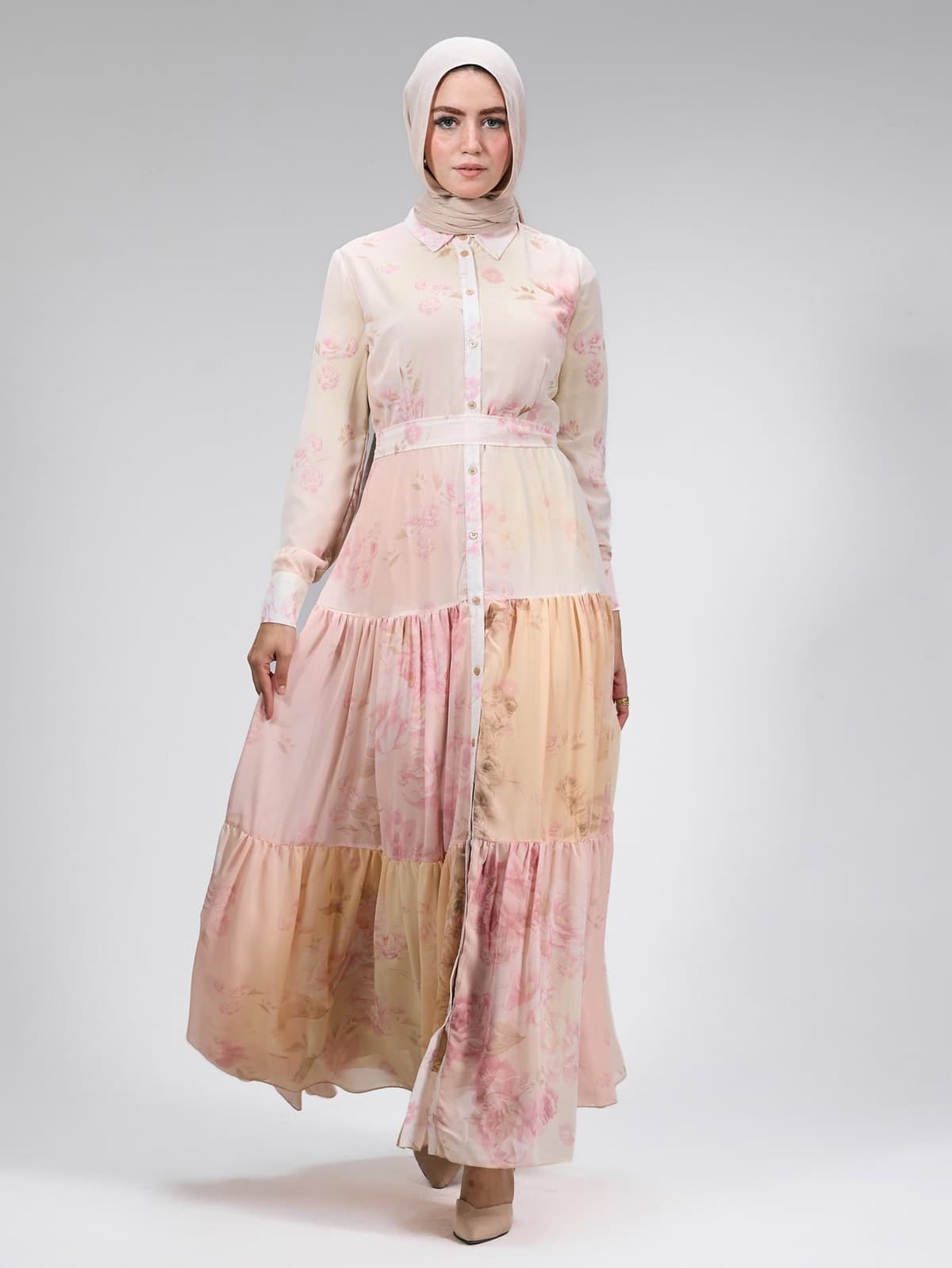 Side profile of the chiffon floral maxi dress showcasing the tiered design