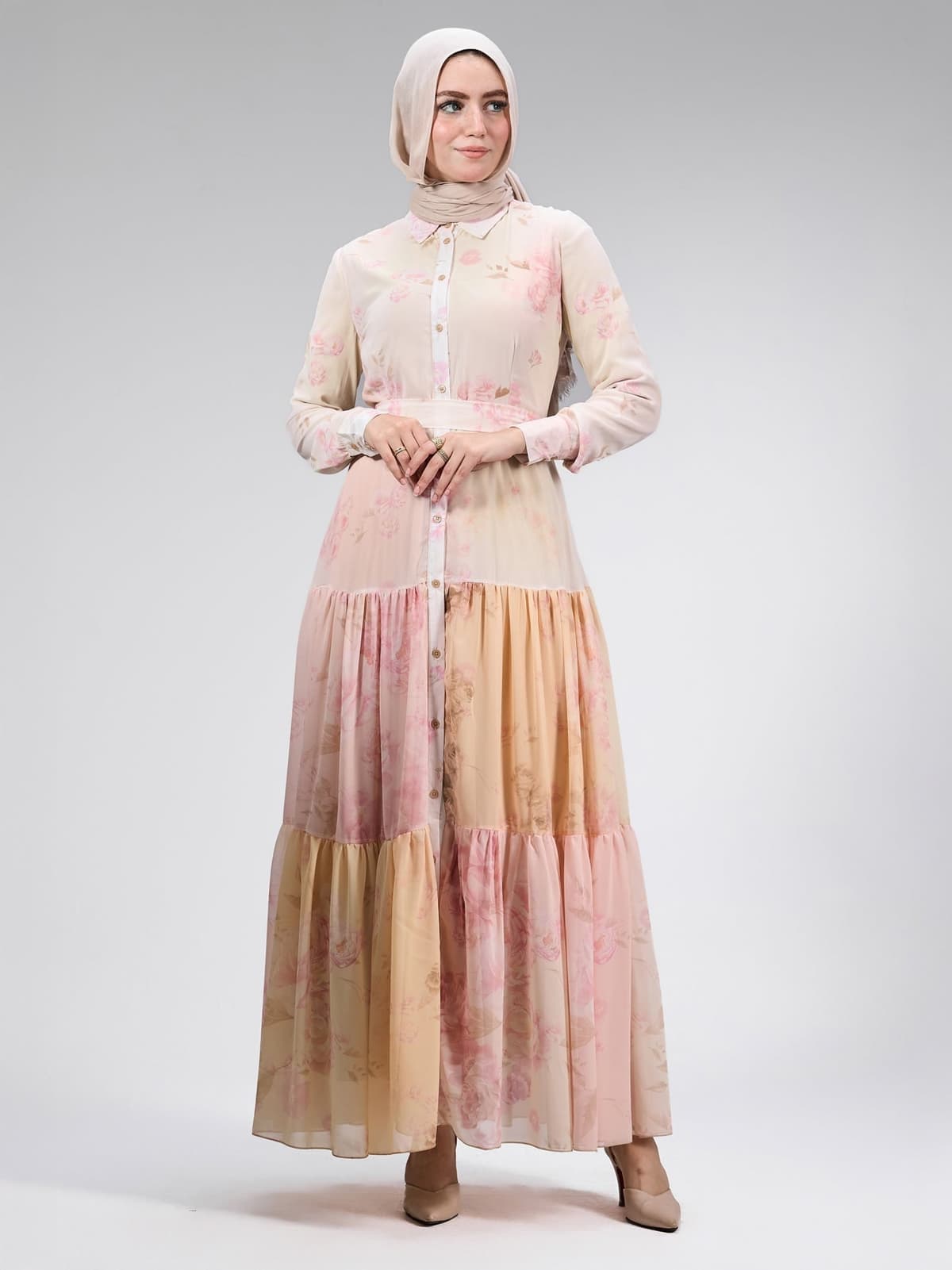 Close-up of the button detailing on the chiffon floral maxi dress