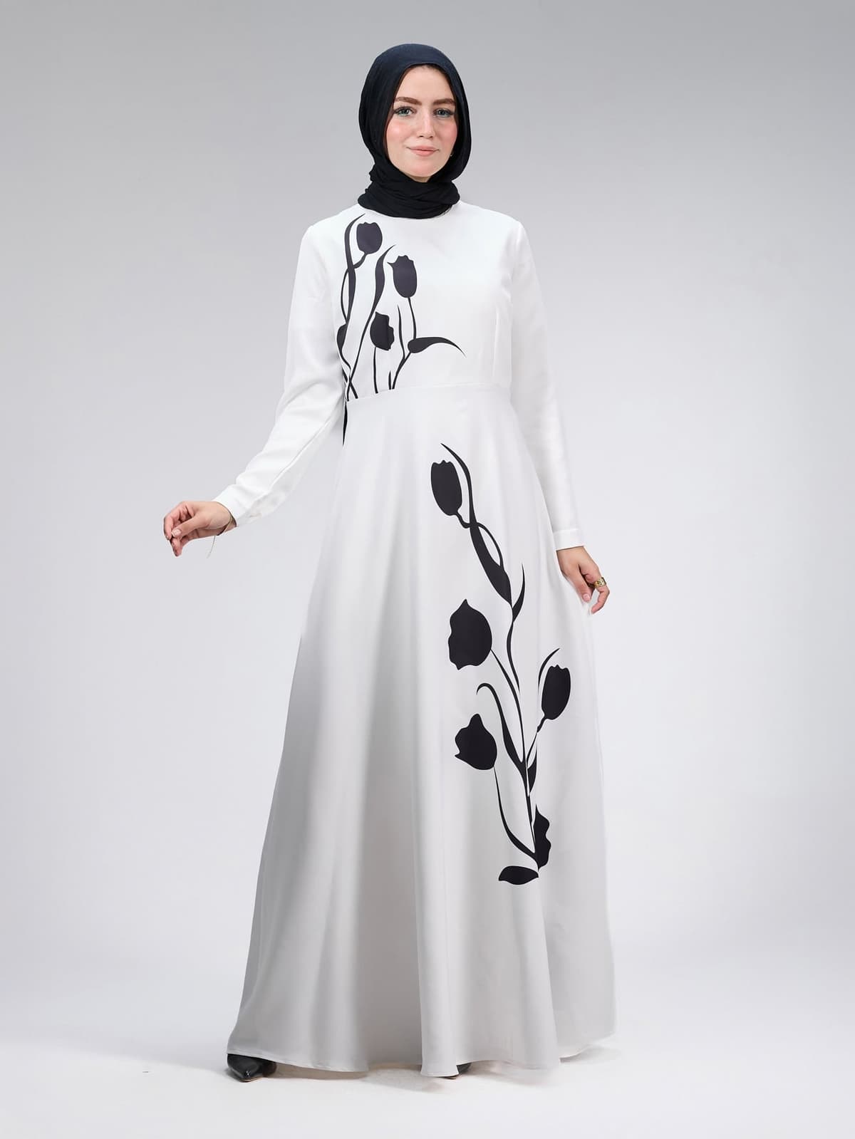 Side view of Graceful Tulip Crepe Maxi Dress with black tulip floral design