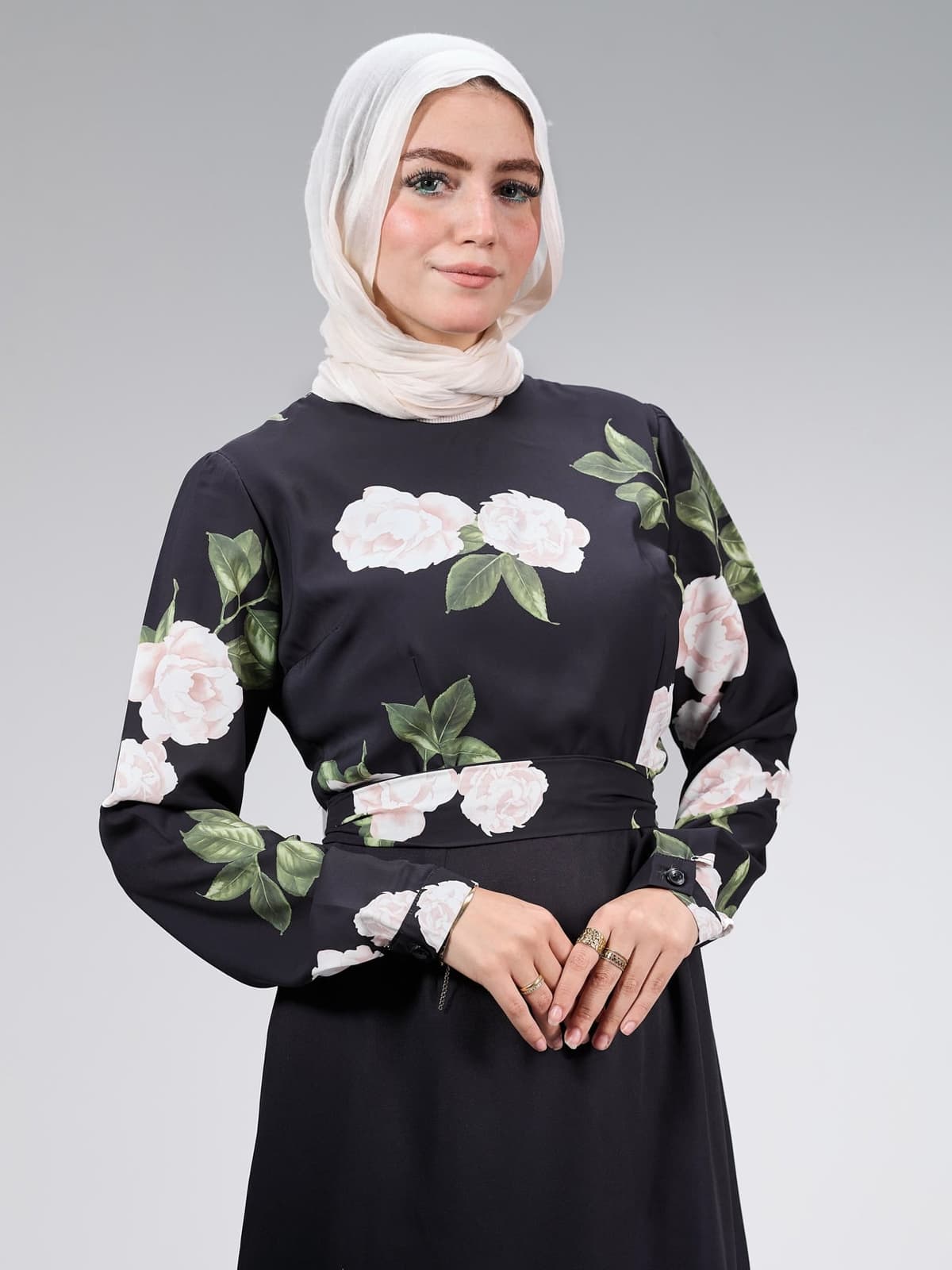 Full-length image of modest black satin maxi dress