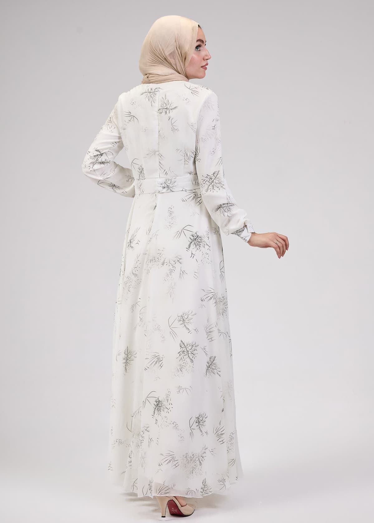 Flared view of Ivory Chiffon Maxi Dress in motion
