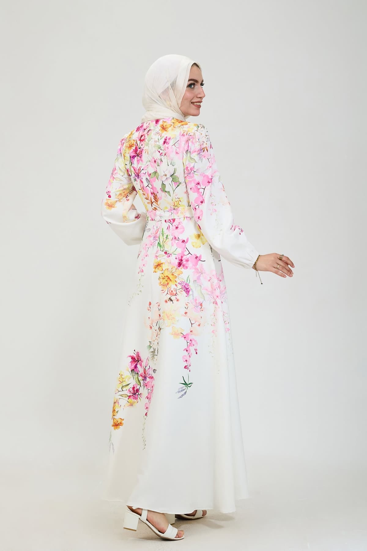 Detail of long sleeves on floral elegance modesty dress