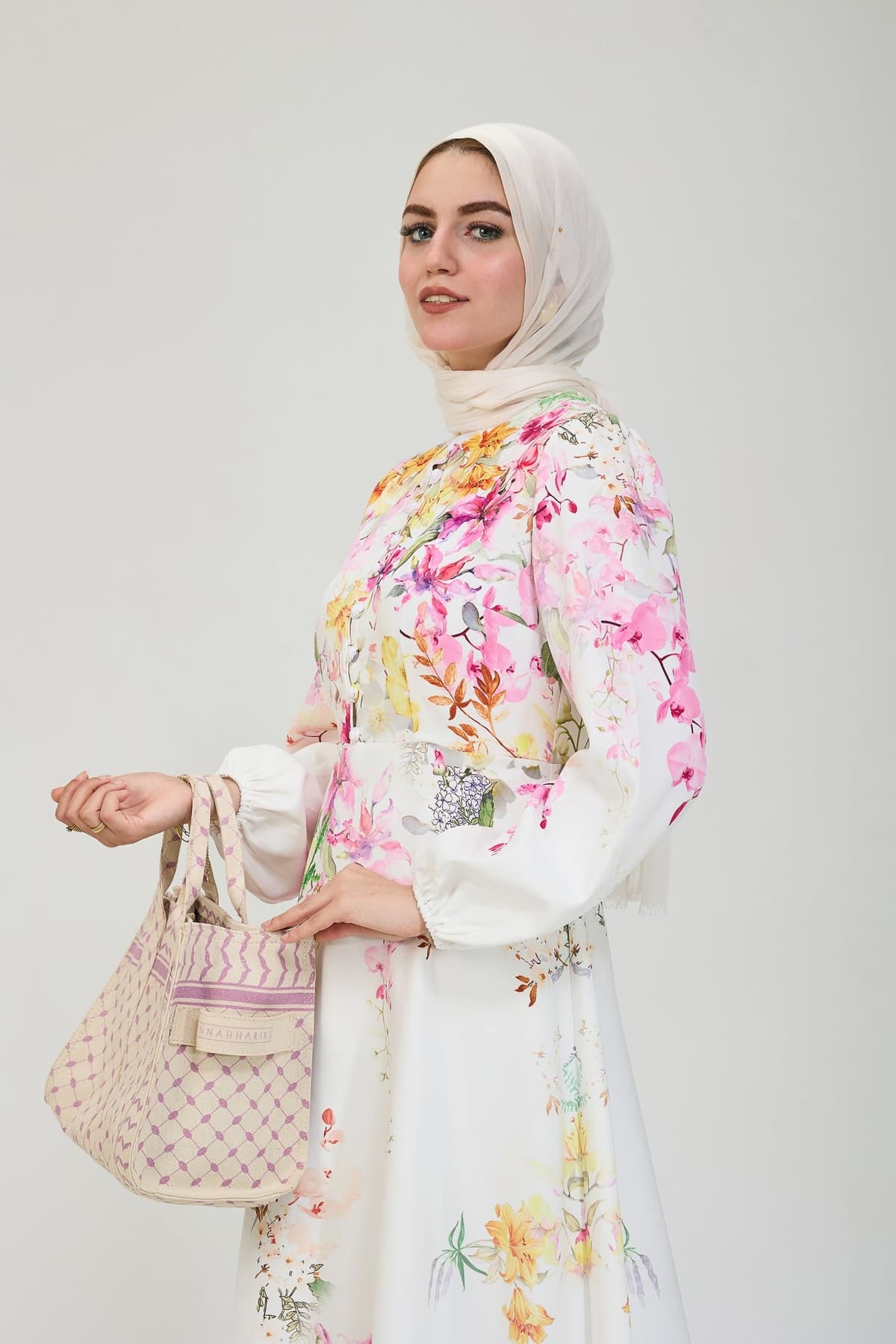 Model styling floral elegance modesty dress with hijab