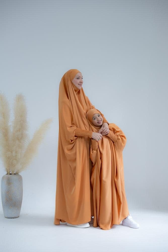 Little Gretaah prayer gown for kids in khimar style with ribbed sleeve cuff in Orange - ANNAH HARIRI