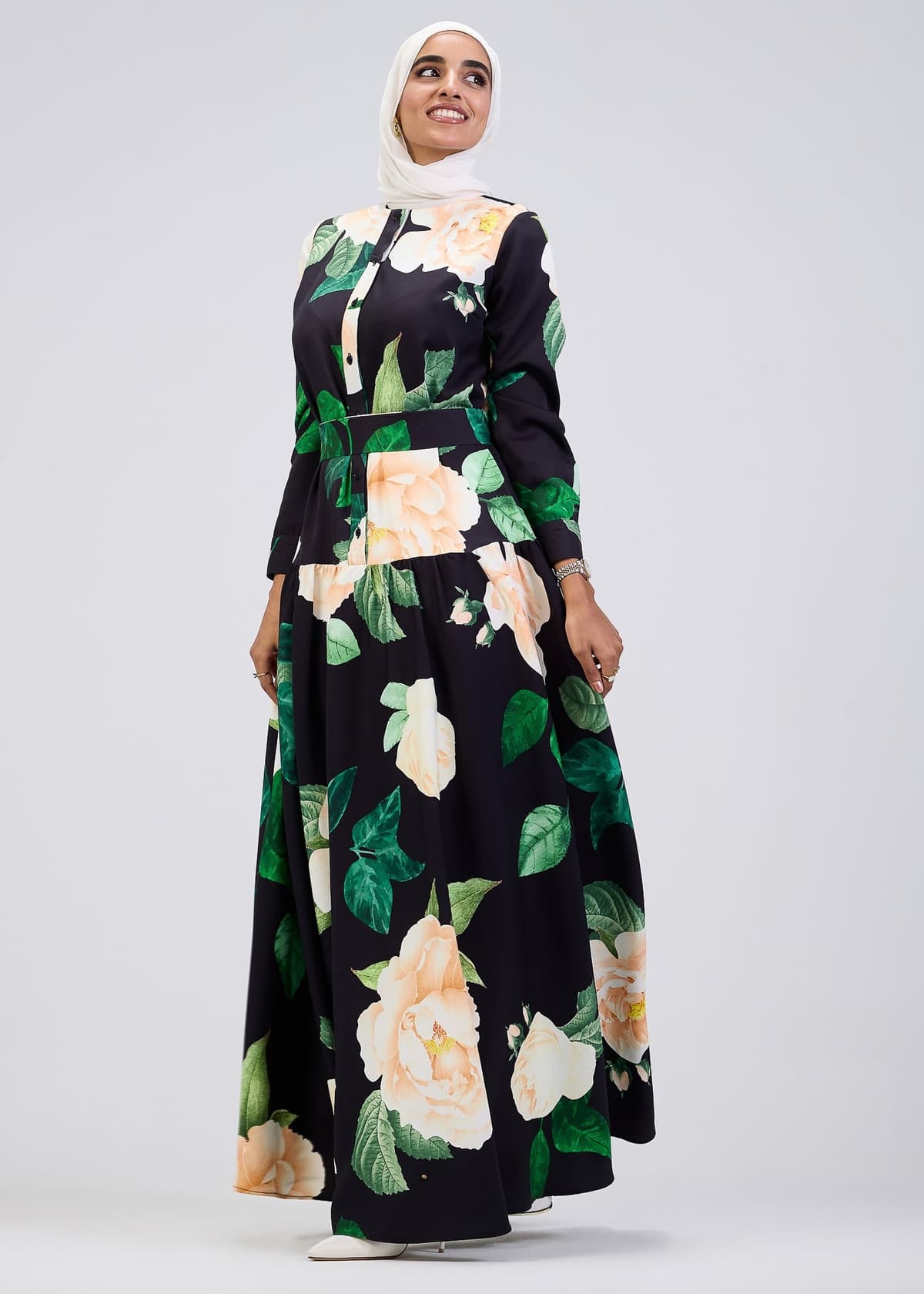 Side view of floral print button-front maxi dress