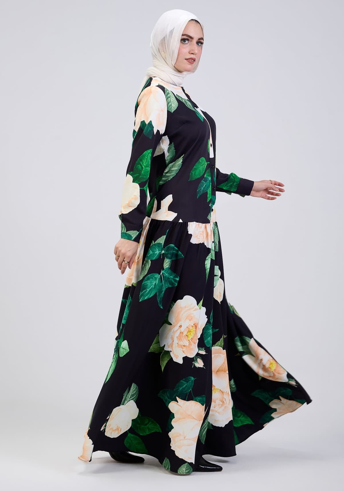 Belted waist detail of floral print maxi dress