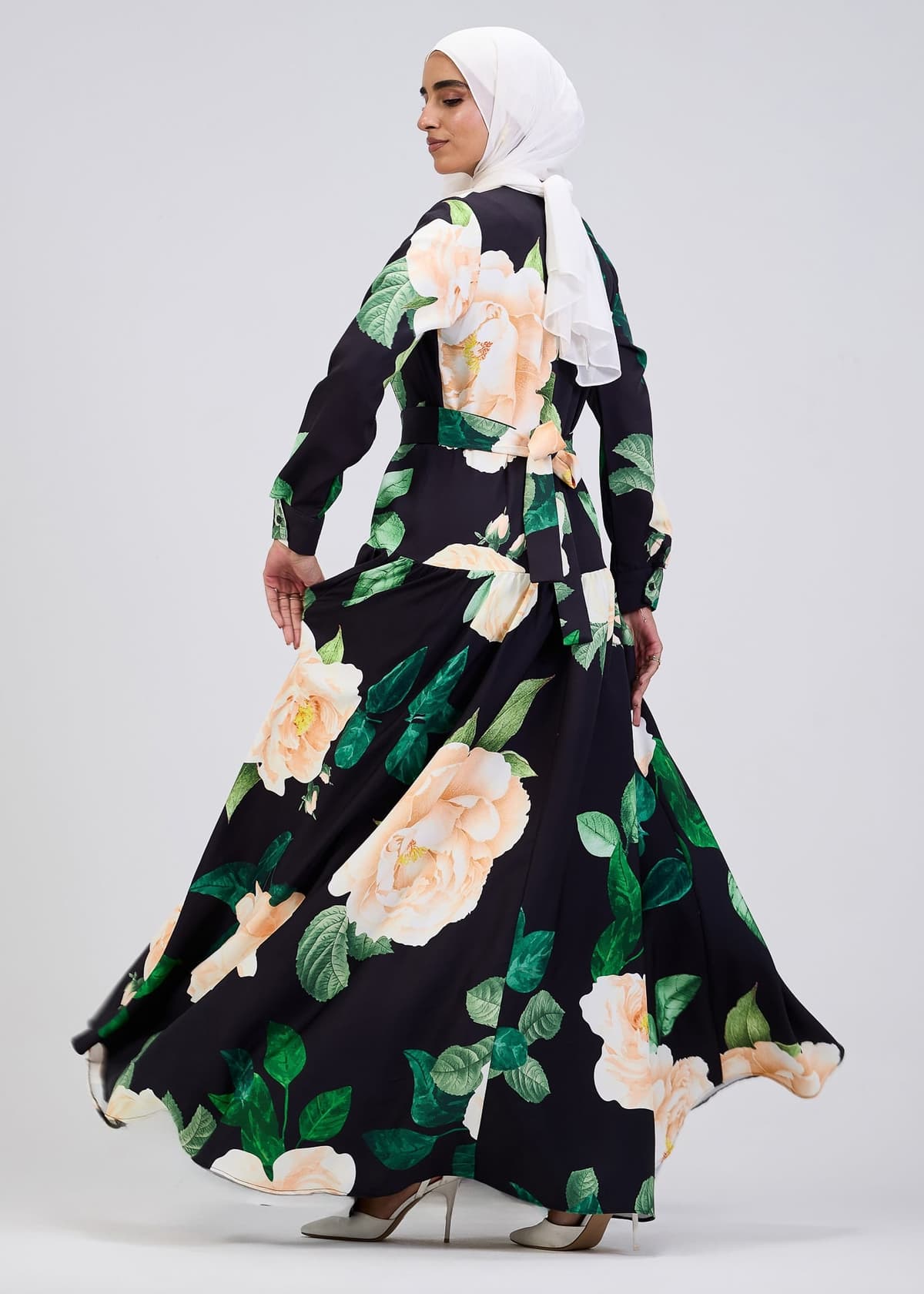 Close-up of floral print on maxi dress