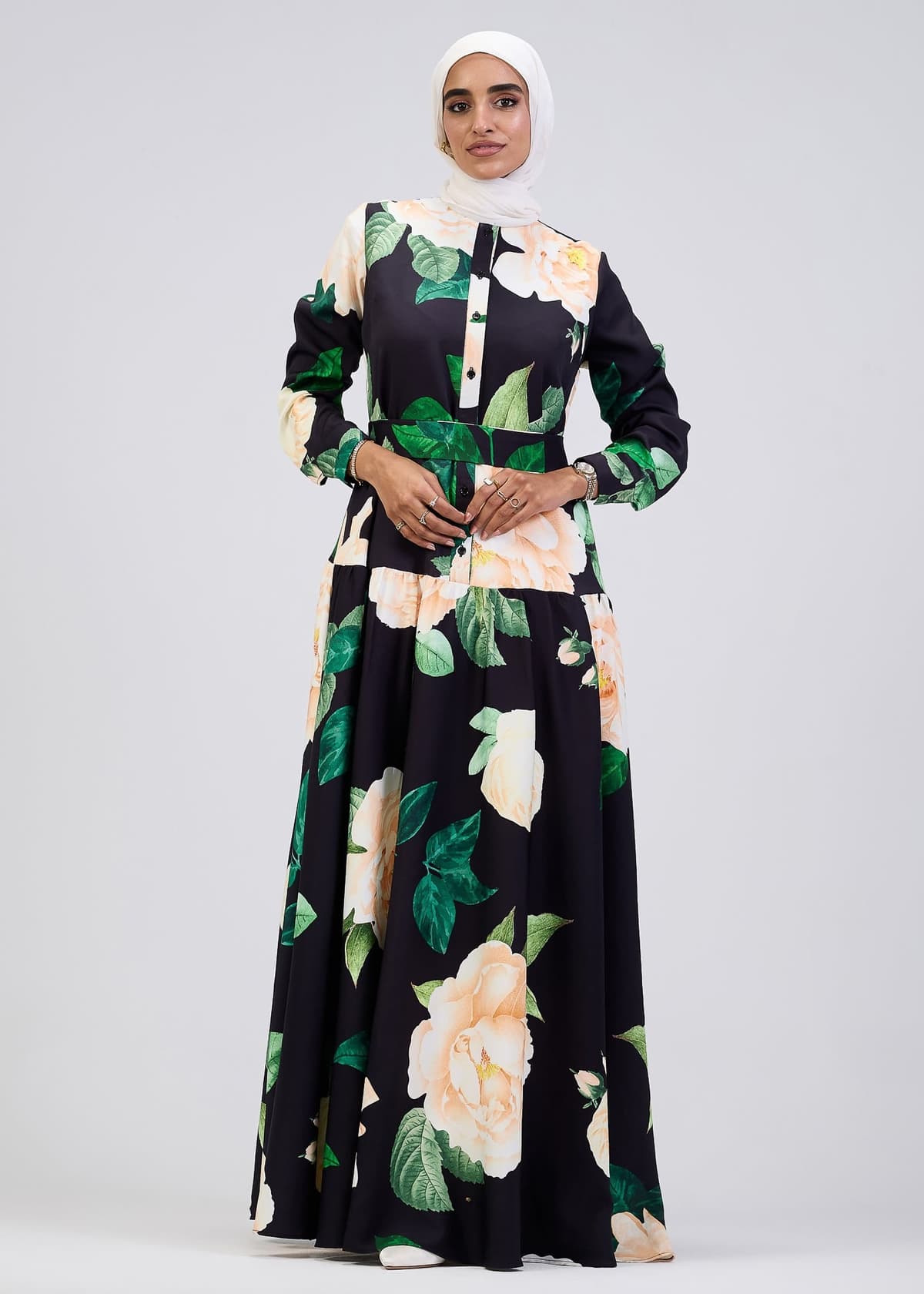 Belted waist detail of floral print maxi dress