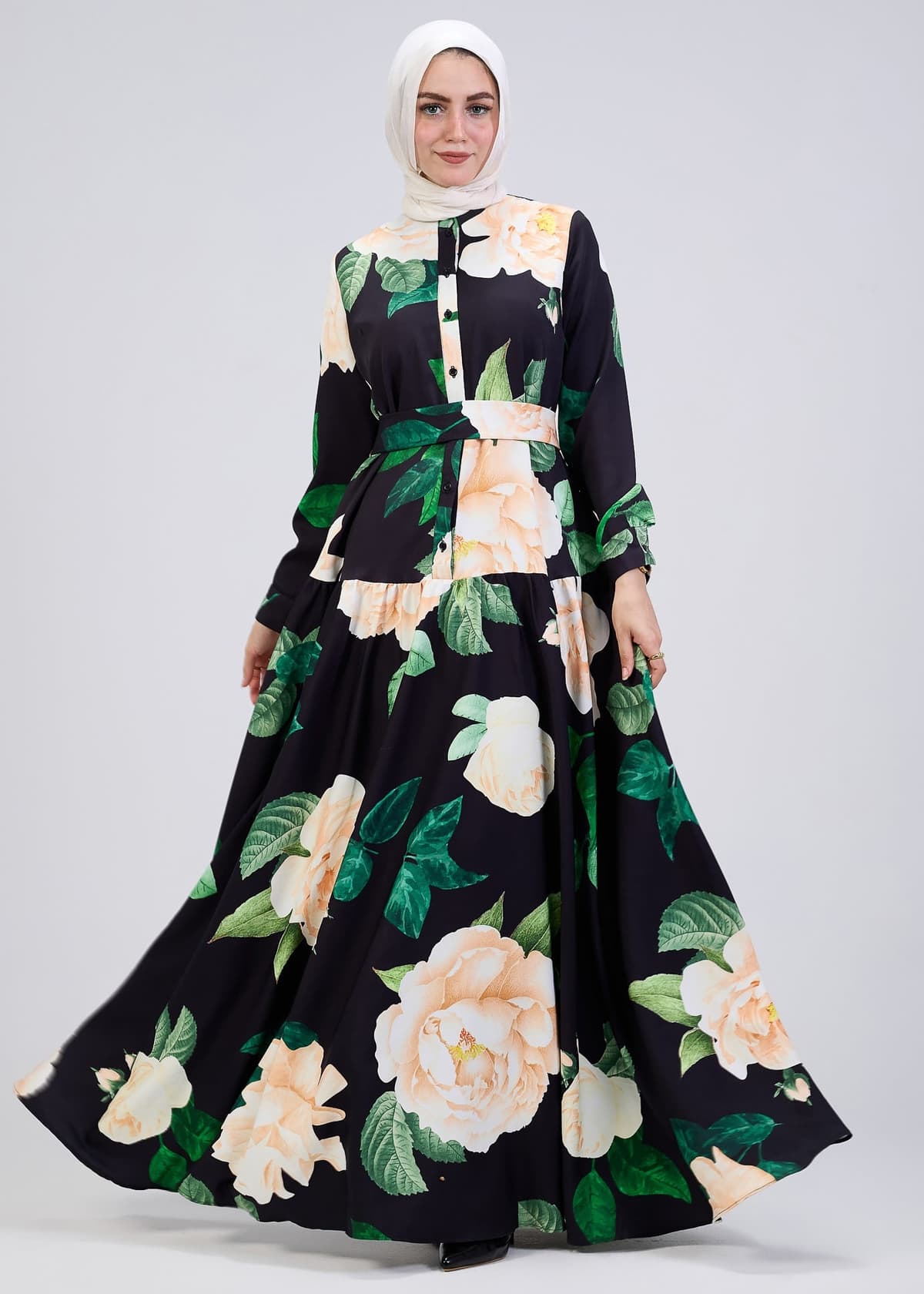 Side view of floral print button-front maxi dress