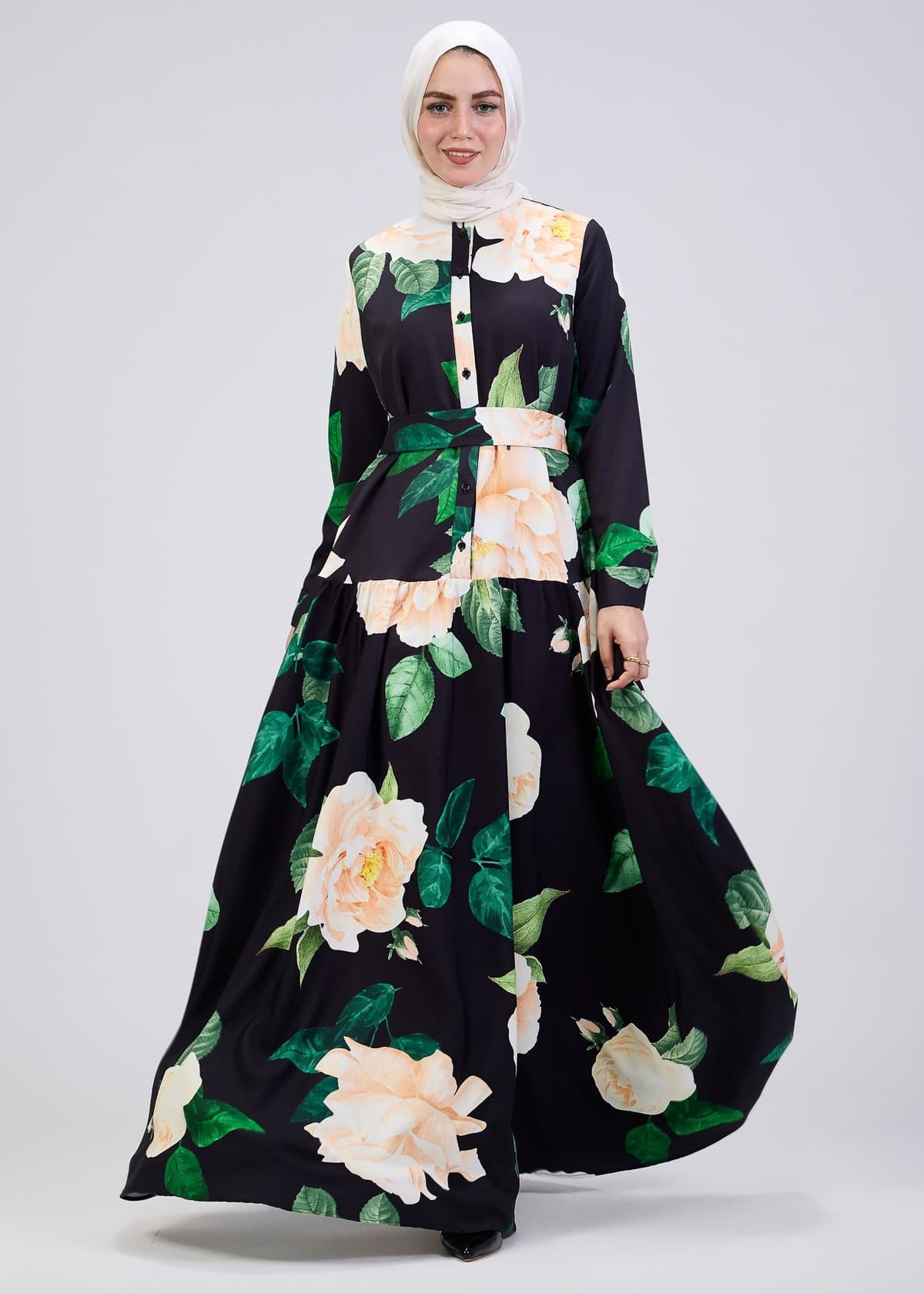 Close-up of floral print on maxi dress