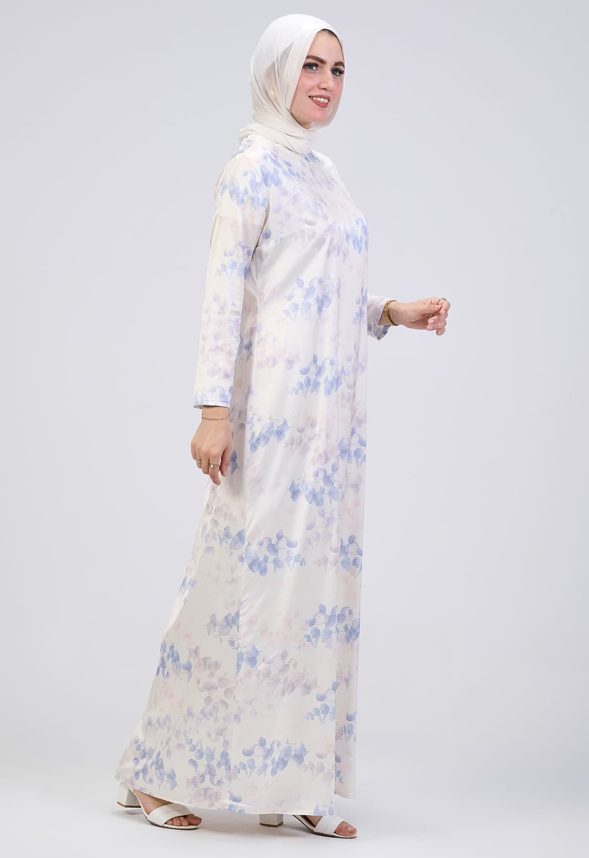 Side view of satin floral wrap maxi dress with bell sleeves