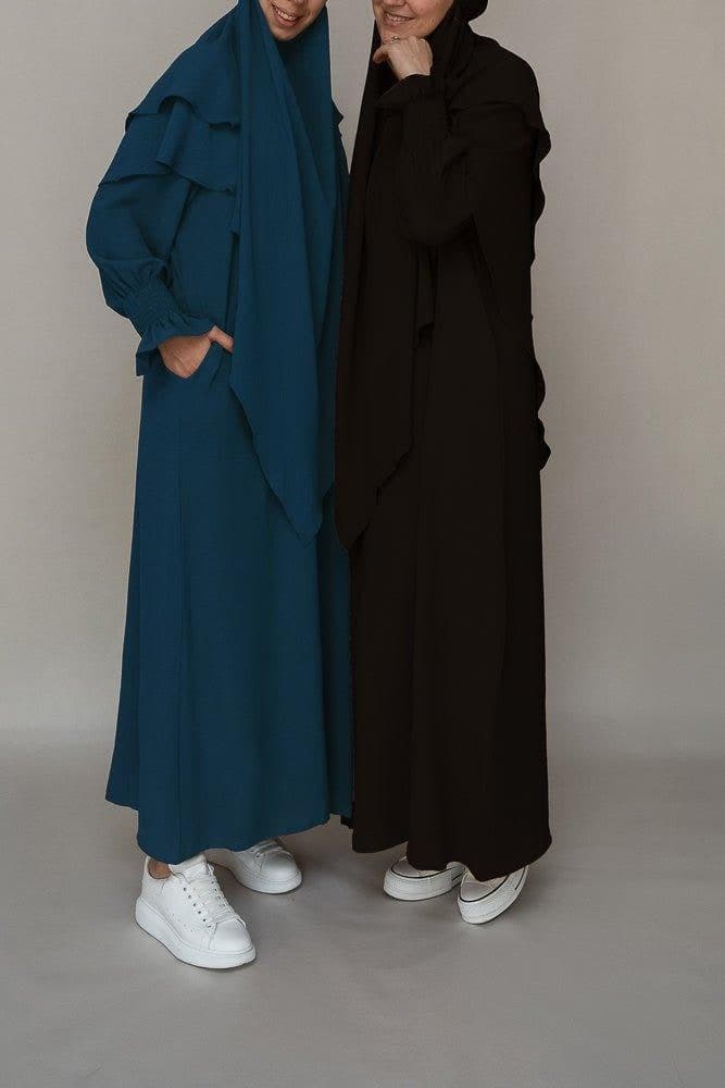Elegant black abaya dress designed by Annah Hariri