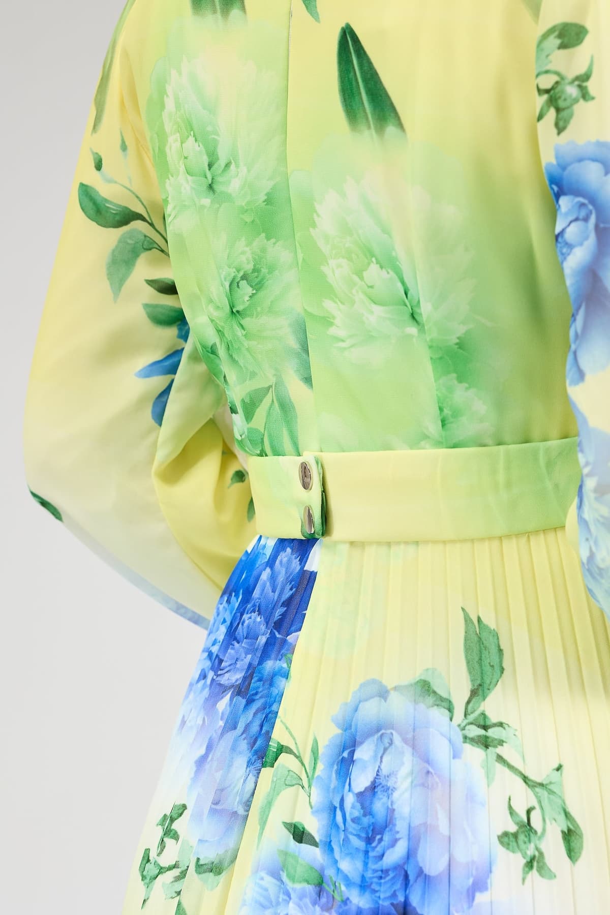 Close-up of floral print on chiffon maxi dress
