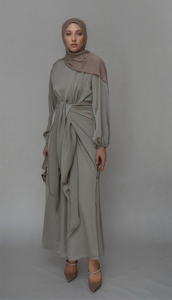 Fleeur maxi abaya dress with detached apron elasticated sleeve like tie waist piece in satin green - ANNAH HARIRI
