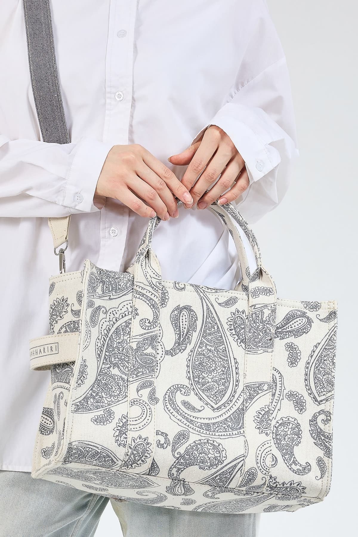 Side view of Paisley Print Canvas Tote