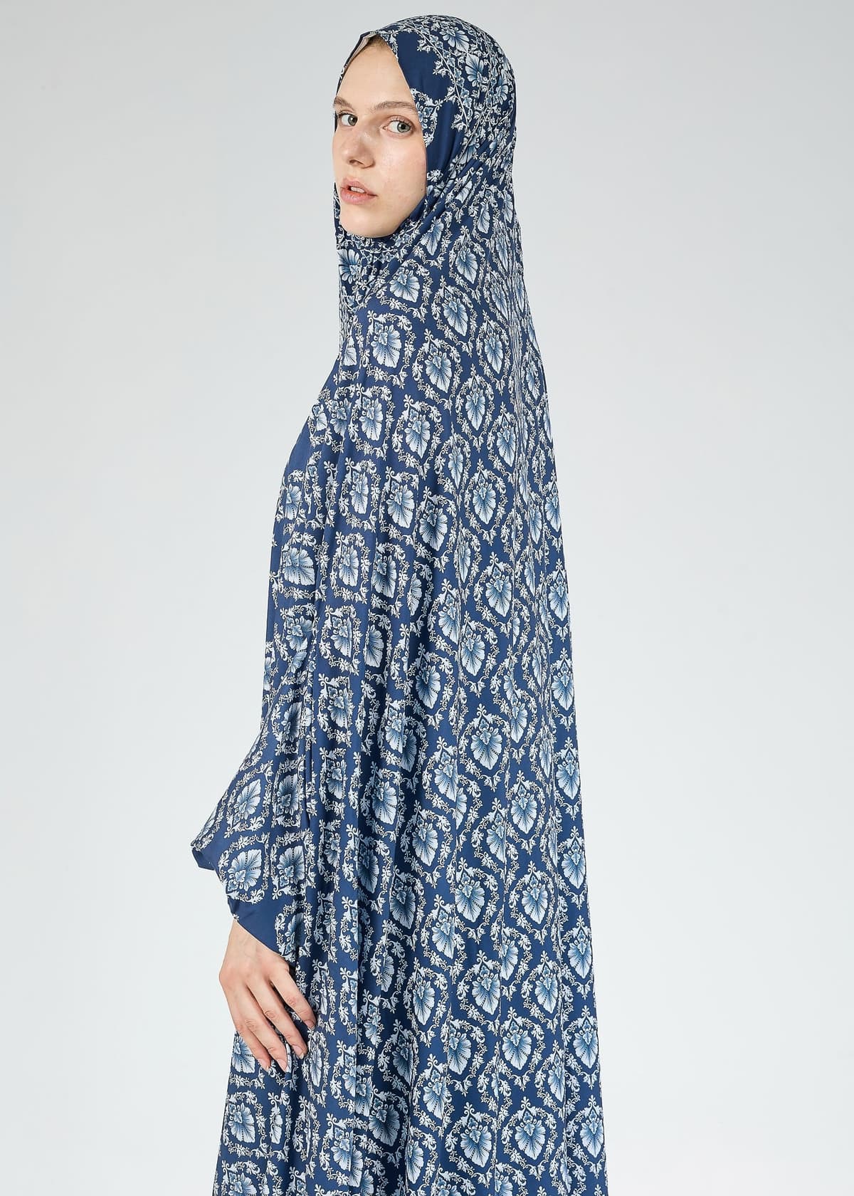 Elasticated cuffs detail on Gzhel satin gown for modest wear