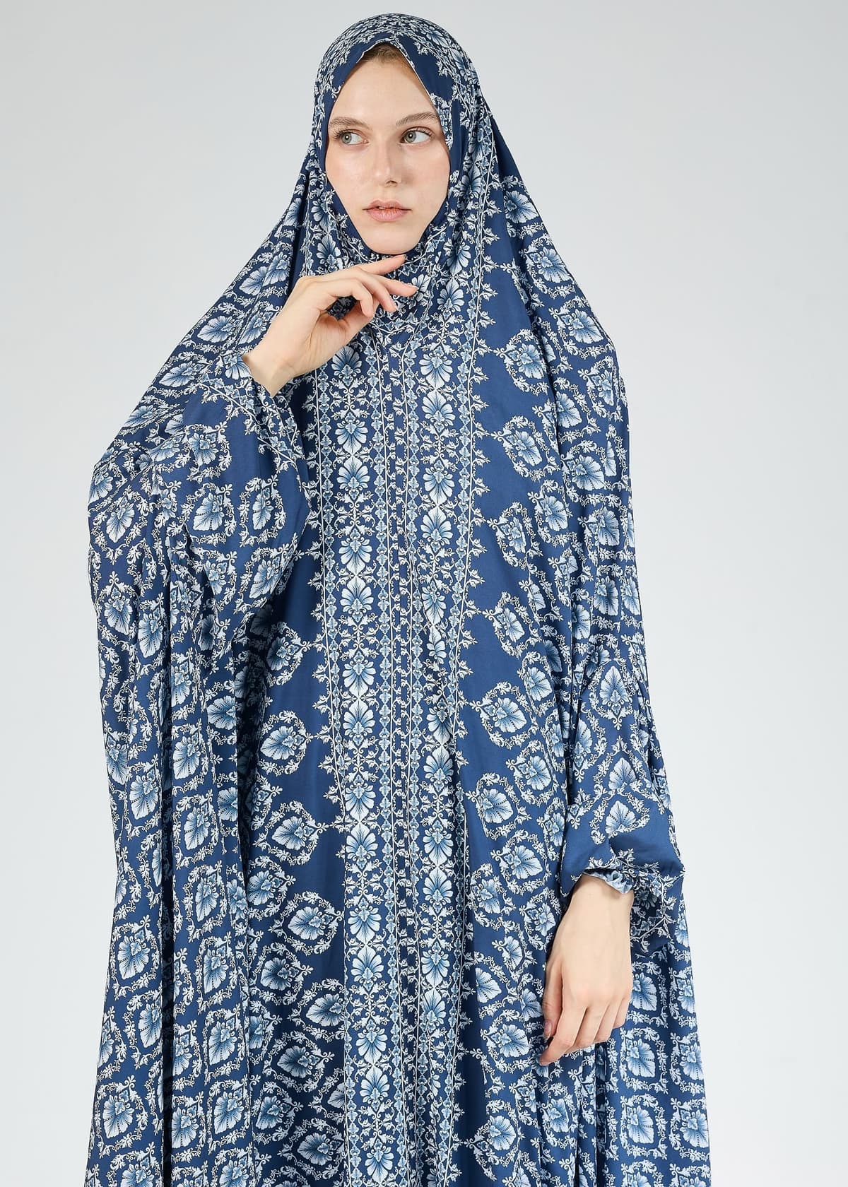 Flowing satin design of blue prayer gown with modesty