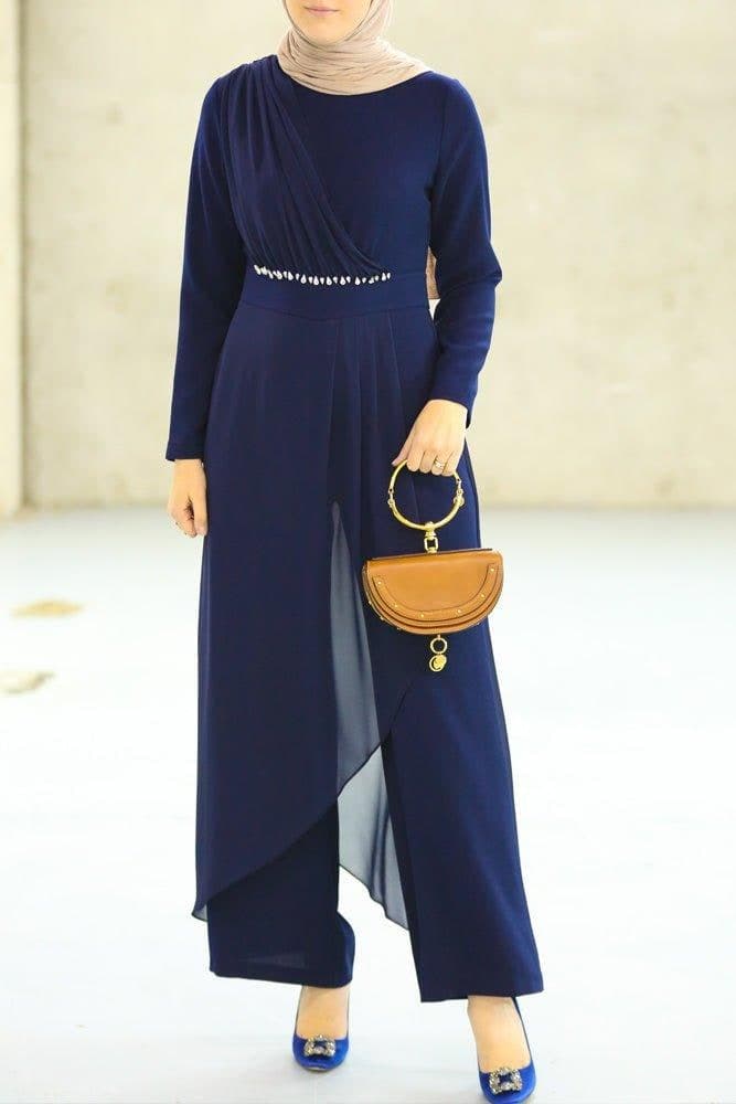 Full body shot of navy blue modest jumpsuit