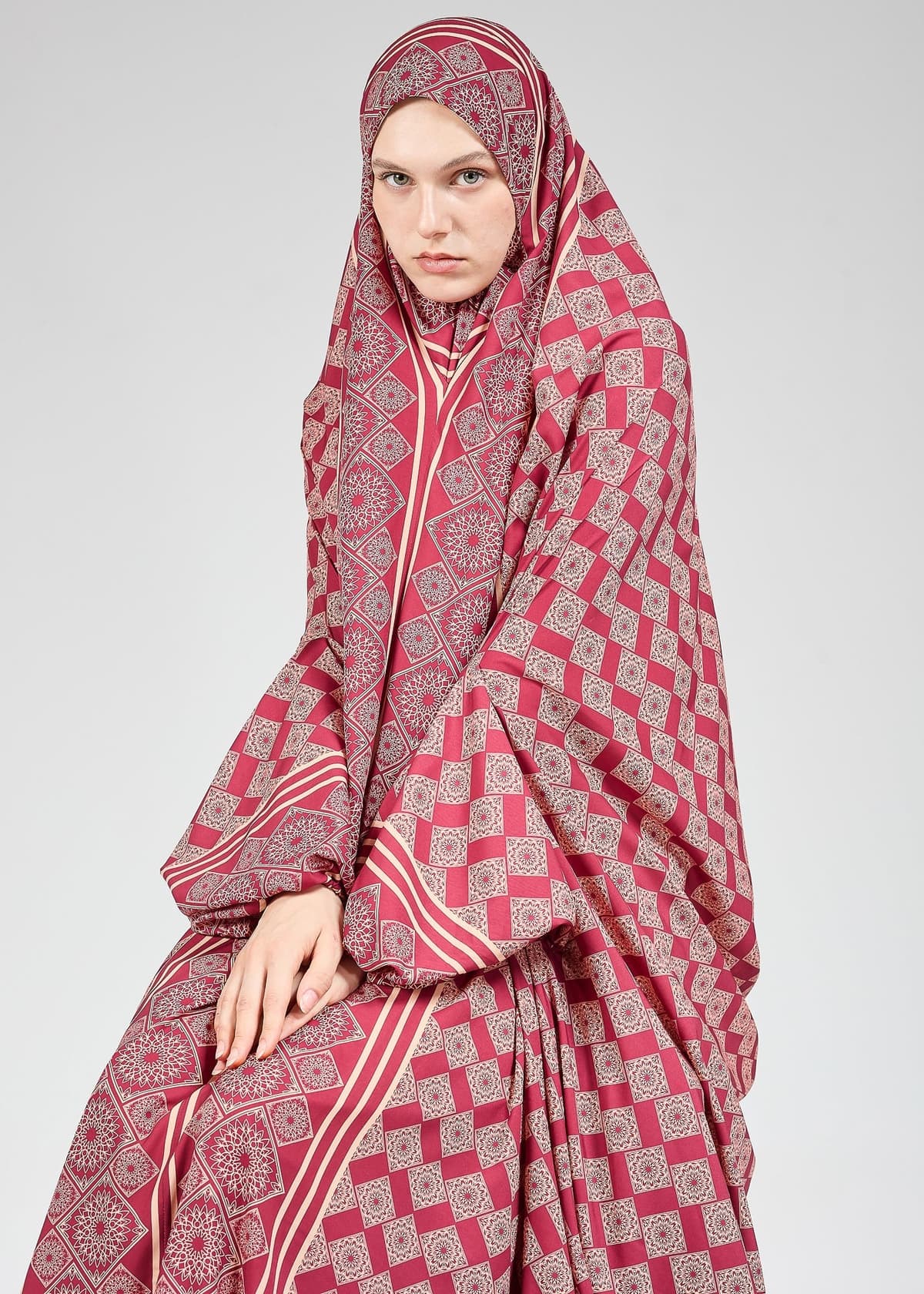 Elegant look of satin prayer gown with floral print for hijab wear