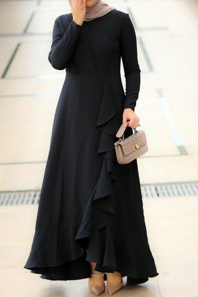 Detailed close-up of the ruffle elements on the dress