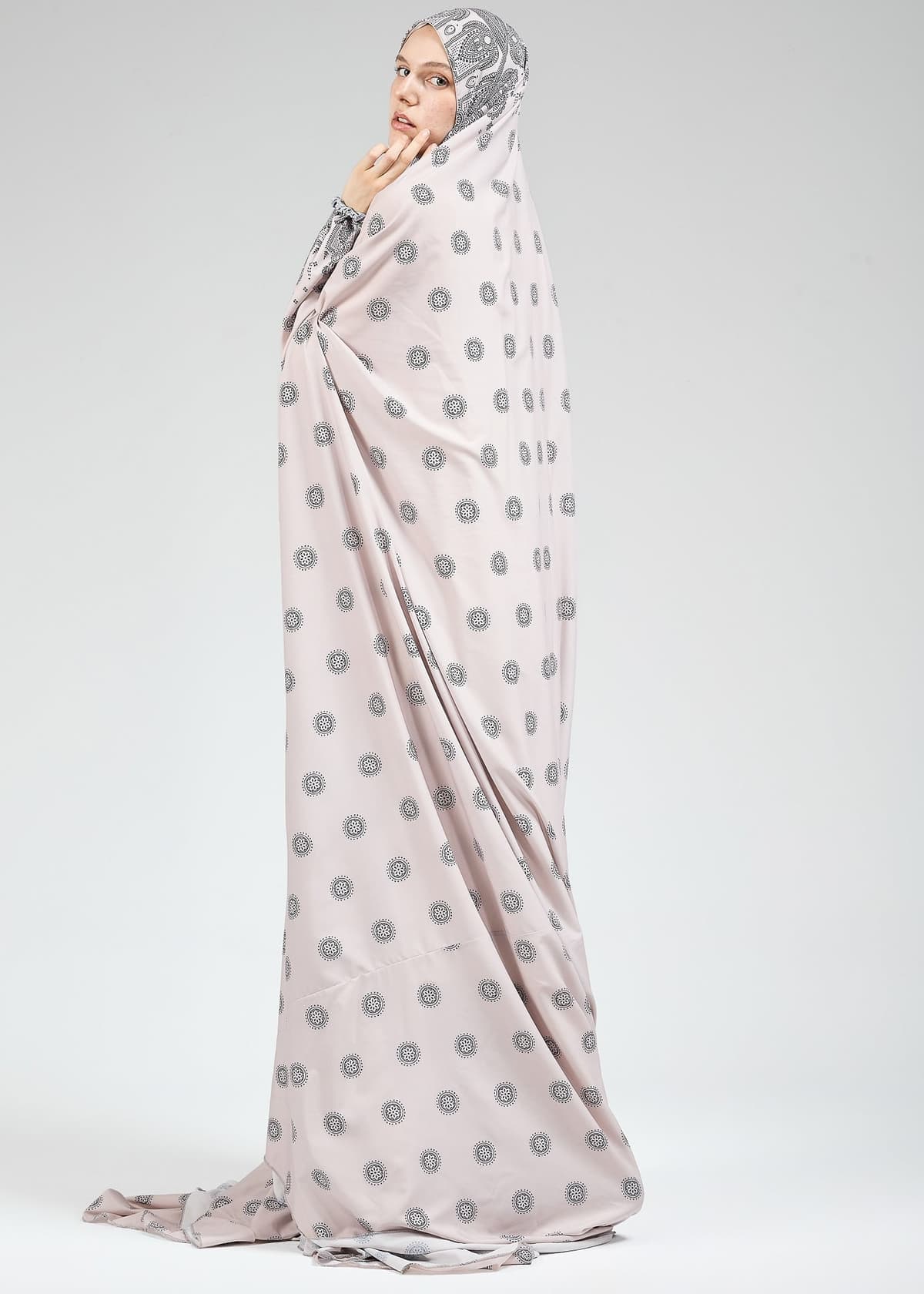 Side view of satin prayer gown with extended coverage