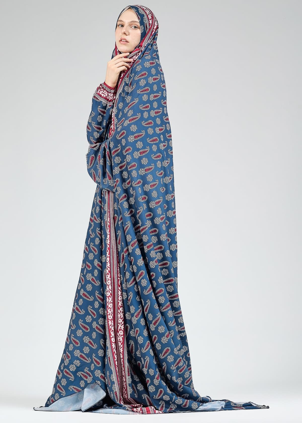 Side view of satin gown in modest fit
