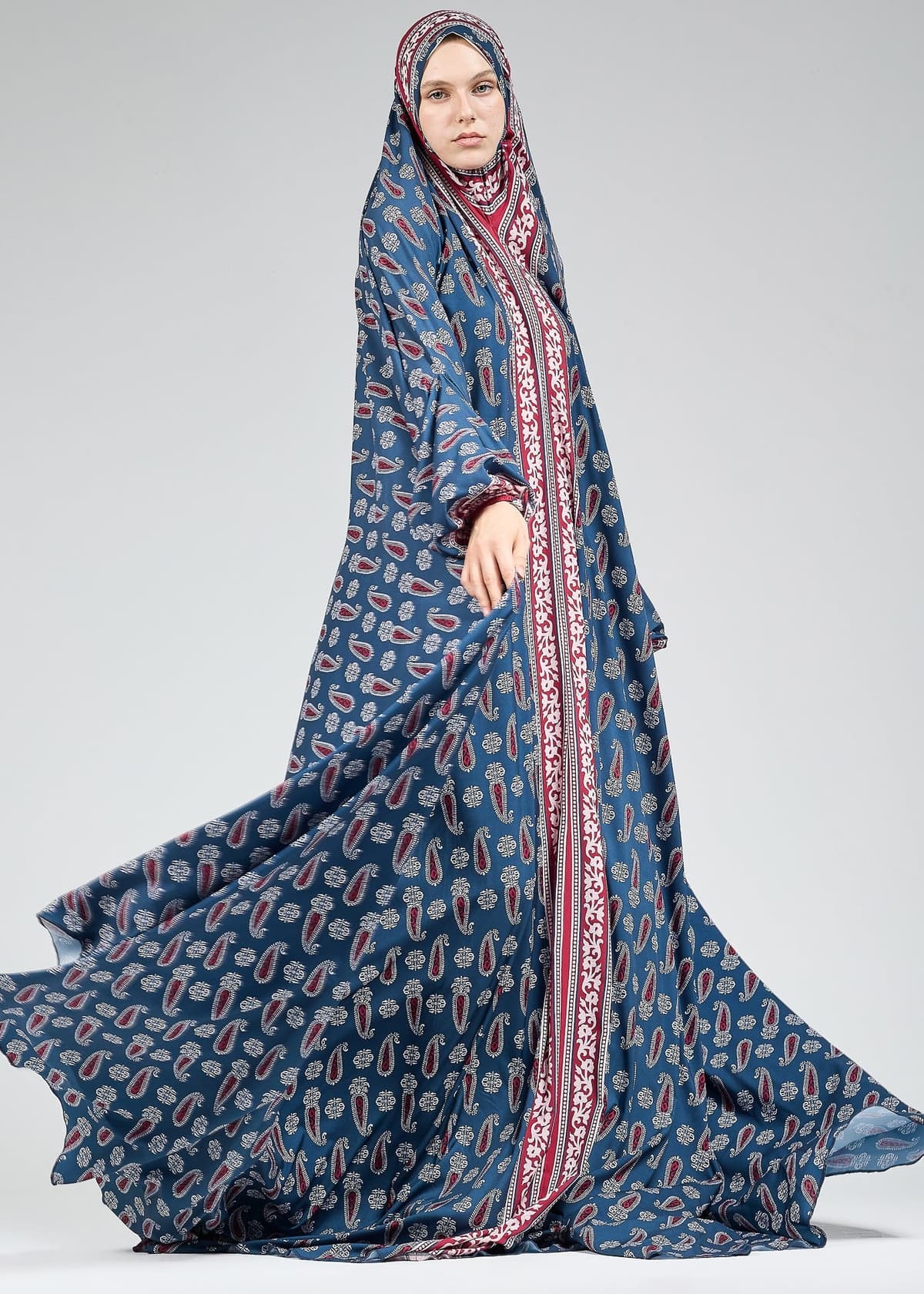 Flowing satin prayer gown with elegant paisley print