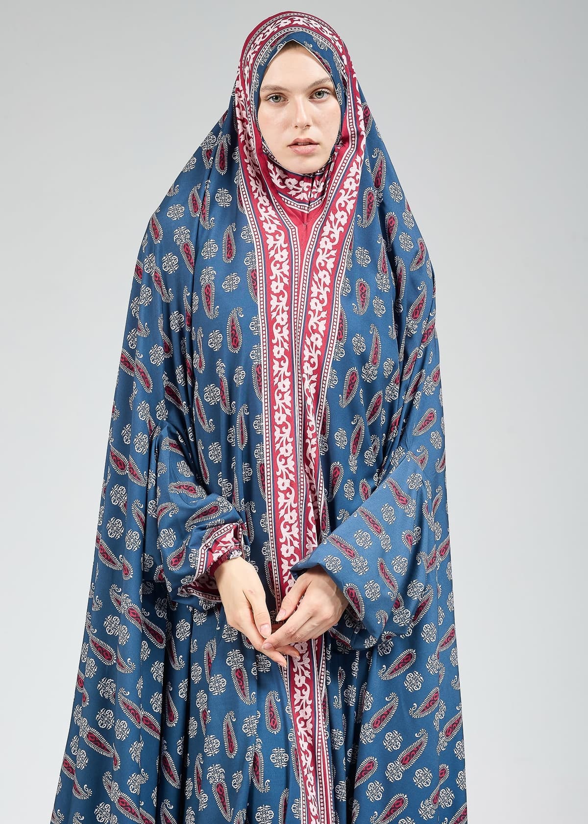 Full-body view of satin gown with paisley print for modest wear