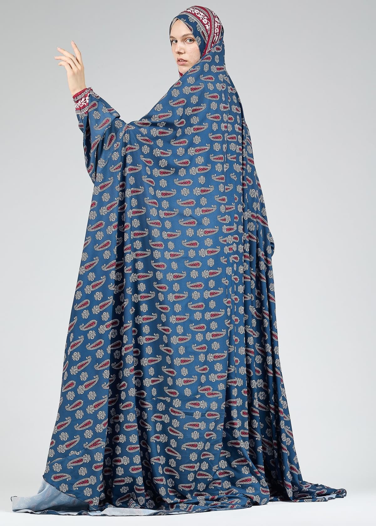 Seated view of the satin prayer gown with full coverage