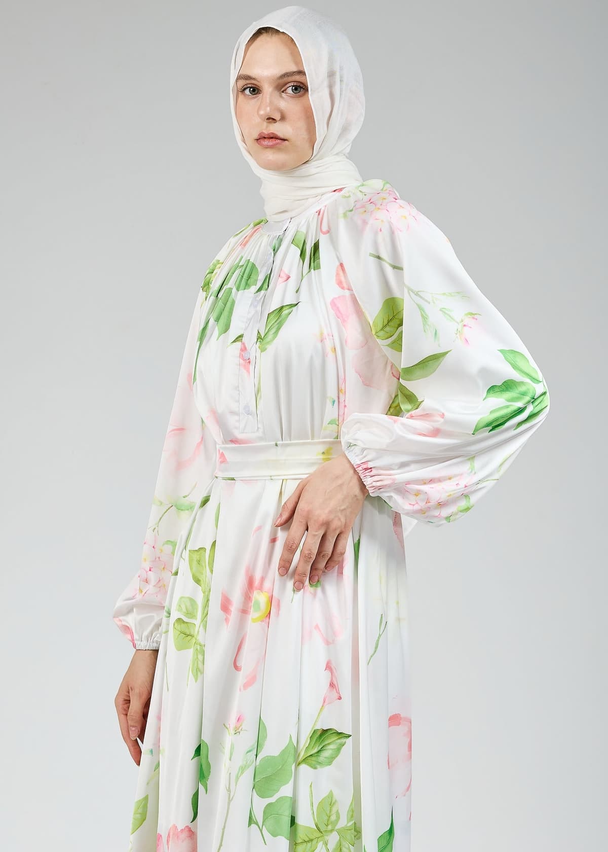 Full-length white satin dress with floral print for formal events