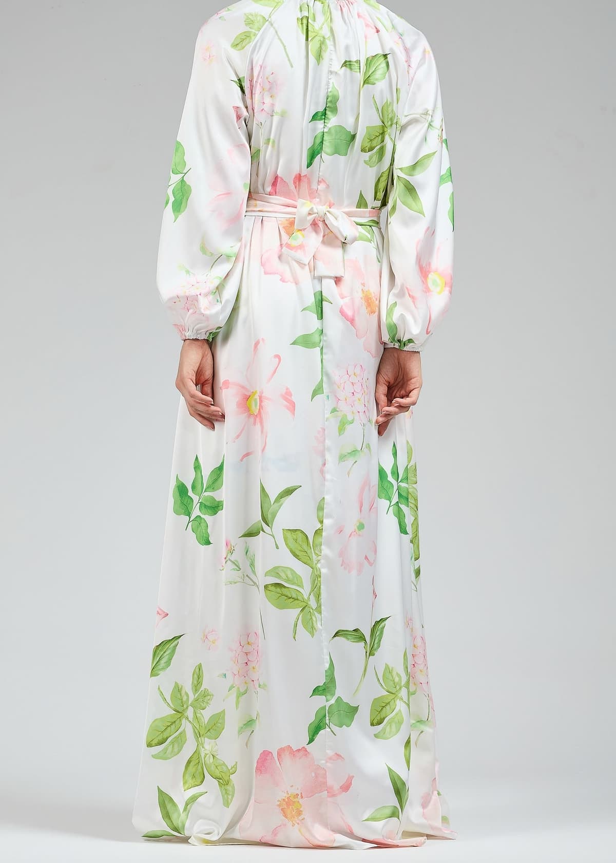 Close-up of the white satin floral dress with detachable belt
